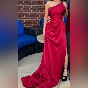 Size 6 red prom dress worn once been hemmed on shoulder
